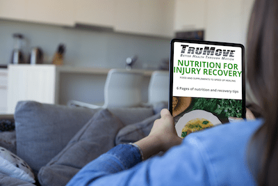 Woman Reading Free Nutrition Booklet on iPad